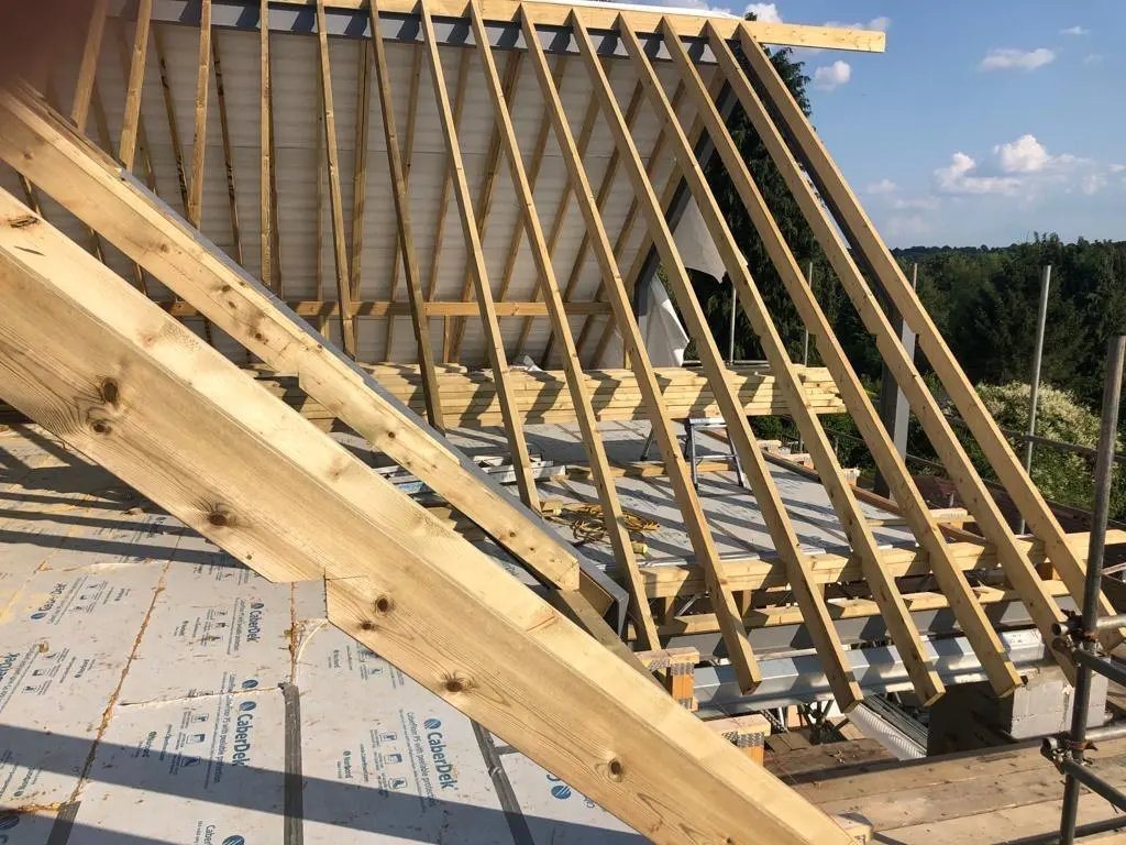 Timber roof framing taking shape over the new upper floor