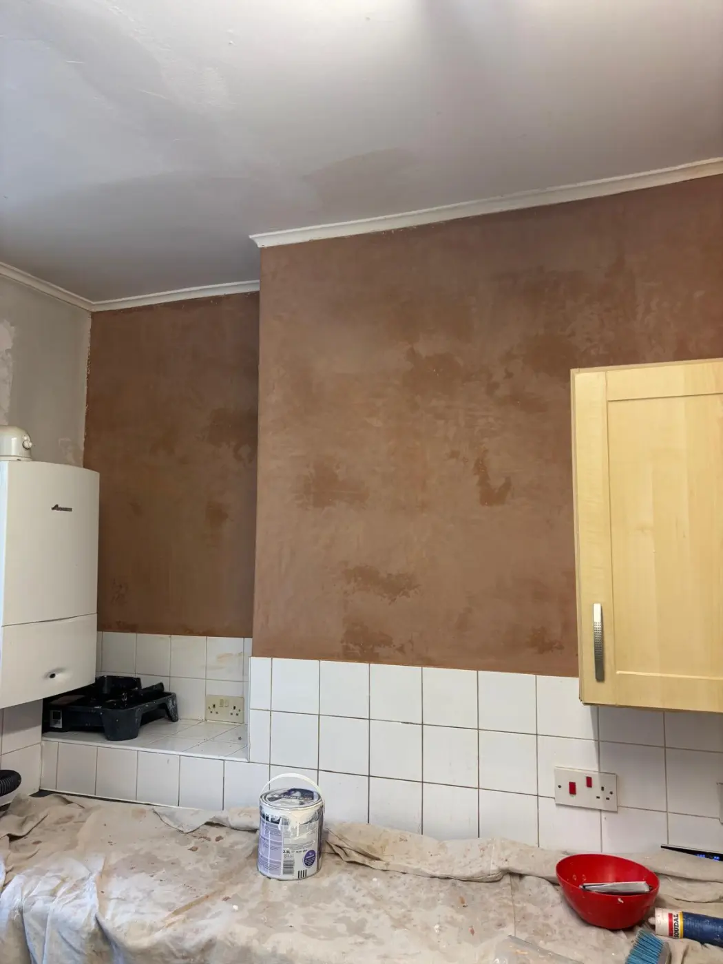 During: the walls prepared and made good for decoration