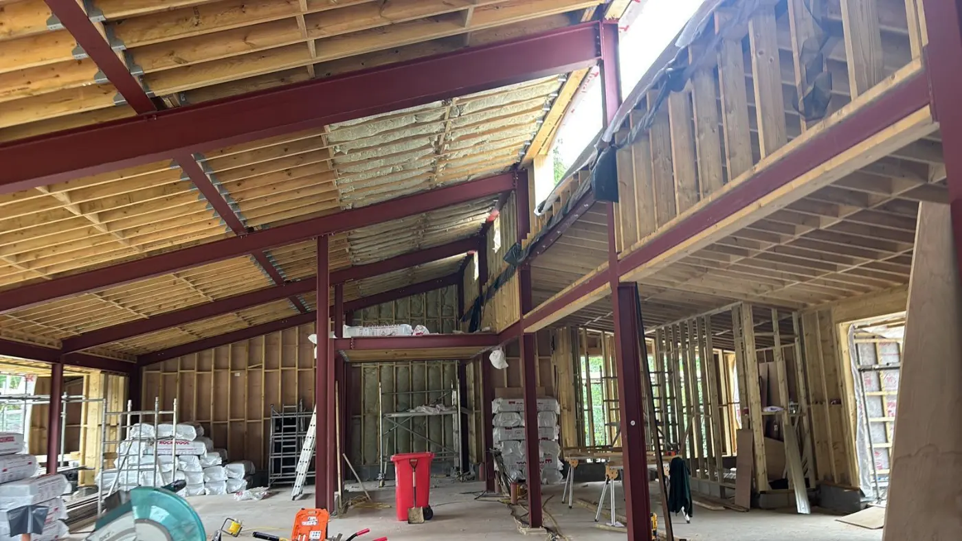 Steel frame and timber roof structure inside a pavilion